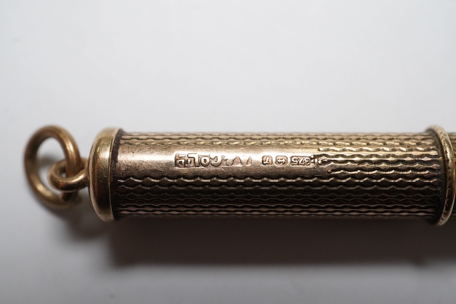 A 1960's 9ct gold cased propelling toothpick, by Asprey & Co Ltd, 48mm. Condition - fair to good